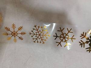 lot 30032 image: Gold Snowflake Window Clings 1 Roll