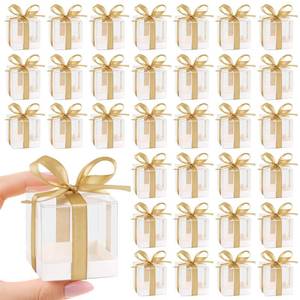 lot 30072 image: Hxezoc 50 Pack Favor Boxes 2x2x2 Inches Clear Candy Treat Boxes with Gold Ribbons, Mini Plastic Gift Boxes for Wedding, Birthday Party, Baby Shower, Classroom Decoration Supplies