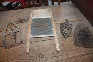 lot 3463 image: Vtg. Washboard and Iron Trivets