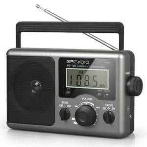 lot 72330 image: Portable Shortwave Radio with Best Reception, AM FM Transistor, LCD Display, Time Setting, Battery Operated by 4 D Cell Batteries or AC Power, Big Speaker, Earphone Jack. POWERS ON BUT NO SOUND.  CLOCK WORKS. - Retail $36