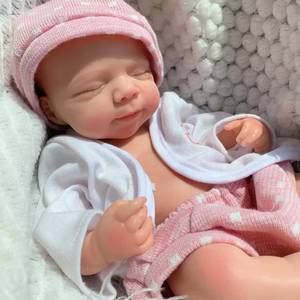 lot 1176 image: Yokyyi Lifelike Full Body Reborn Baby Doll, 13 Inch Pascale Sleeping Girl in Pink Dress, Perfect for Christmas Presents