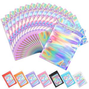 lot 14002 image: Funfery 100 pc Mylar Holographic Bags Packaging Bags,2.4x3.9in Clear Resealable Smell Proof Bag Foil Pouch Bag for Party Favor,Food Storage Baggies Packaging for Small Business