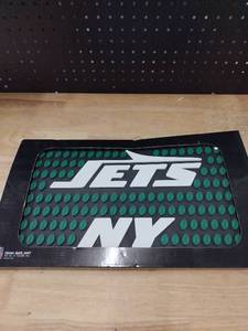 lot 1310 image: New York Jets team bar mat approximately 19 by 10.85 in