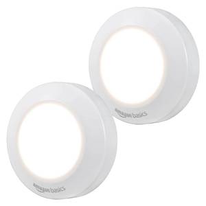 lot 4167 image: Amazon Basics LED Puck Lights, Battery Operated, 50 Lumens, Under Cabinet Lighting, Easy to Install, Easy to Use, Adhesive Backing, 2-Pack, White