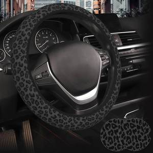 lot 8220 image: Black Leopard Print Steering Wheel Cover for Women, Universal Fit 14.5-15 Inch with Non-Slip Grip and Thermal Control, Includes 2 Ceramic Absorbent Cup Coasters, Compatible with Cars, SUVs, Trucks.