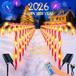 lot 13944 image: BOSSERN Upgraded 24 Pack Candy Cane Solar Christmas Lights Waterproof, Rechargeable Pathway Lights with Remote, Solar Powered & USB Charging Christmas Decorations Outdoor for Garden Lawn Yard Party