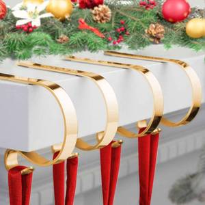 lot 6324 image: Christmas Stocking Holder,4 Pack Stocking Holders for Mantle,Non-Slip Stocking Holders for Christmas Decorations,Lightweight Stocking Hangers for Mantel Fireplace with Adjustable Design,Gold