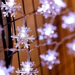 lot 6326 image: Mudder Christmas Snowflake String Lights, 10ft 30 LED, Battery Powered, 8 Modes, Remote and Timer Control Decoration for Christmas Snow Theme Parties Indoor Outdoor Lighting