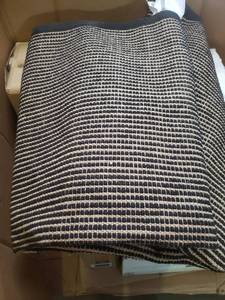 lot 19641 image: Black and brown woven wool rug 86x116