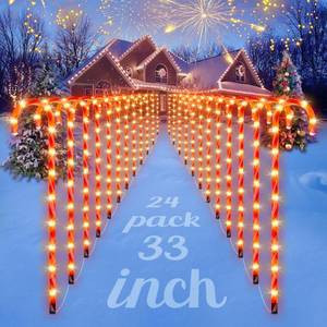 lot 1431 image: COOLWUFAN 24 Pack Chrismas Candy Cane Lights, 33 Light Up Candy Cane Chrismas Decoration Outdoor Yard, Waterproof Xmas Outside Decor Pathway Lights