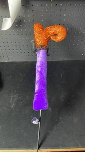 lot 10317 image: Orange and Purple Glitter Decorative Stick