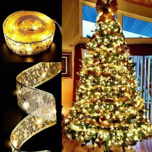 lot 11923 image: Hongsome Ribbon Lights for Christmas Tree Decorations,32ft 100 LED Lights Gold Edge Wired Ribbon Fairy Lights for Xmas Tree Wedding Birthday Party Home Holiday Decor