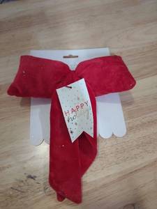 lot 12454 image: Festive Red Velvet Holiday Bow with Tag
