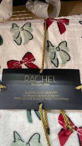 lot 13342 image: Rachel Roy Plush Throw Blanket with Bow Pattern