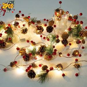 lot 10420 image: 2 Pack Artificial Christmas Garland with Lights - Battery Operated 6.56FT Prelit Garland with 20 LED lights, Red Berries, Pine Cones, Pine Needles Decor for Xmas Tree Thanksgiving Home Fireplace Party