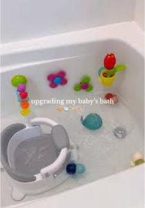 lot 13438 image: Baby Bath Time seat with toys