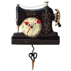 lot 13490 image: Allen Designs Vintage Stitch Sewing Machine Pendulum Wall Clock