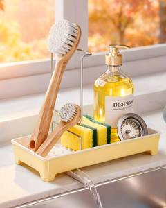 lot 8153 image: Caumic Minimalist Sink Caddy, Rustproof Sponge Holder for Kitchen Sink with 304 Stainless-Steel Brush Holder, Countertop Rack Organizer with Raised Ridges & Silicone Drain Tube (Pastel Yellow)