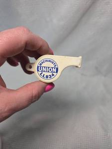 lot 60 image: Machinist Union L834 Plastic Whistle