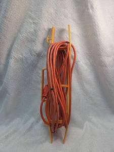 lot 85 image: Orange Heavy Duty Extension Cord with Cord Keeper