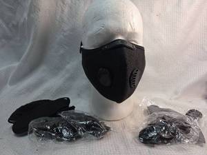 lot 172 image: Reusable face mask featuring dual breathing valves, adjustable ear straps, and washable fabric construction. Includes multiple mask pieces in sealed packaging