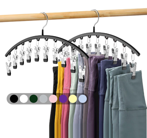 lot 17263 image: Legging Organizer for Closet, Metal Yoga Pants Hangers 2 Pack w10 Clips Holds 20 Leggings, Space Saving Hanging Closet Organizer wRubber Coated Closet Organizers and Storage, Black - Retail $0