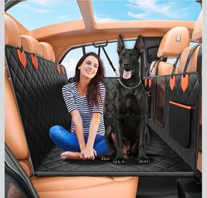 lot 17439 image: Dog Seat Cover for Back Seat, Hard Bottom Back Seat Extender Holds 500 lbs, Waterproof & Nonslip Car Hammock for Large Pets, Comfortable Travel Seat Protector for SUV and Sedan - Retail $79