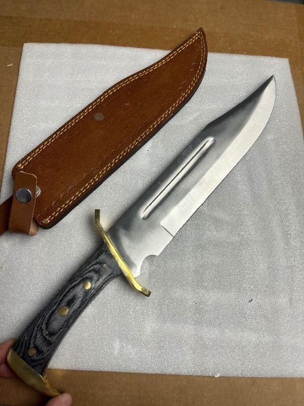 lot 9 image: Never Been Used Beautiful Huge Bowie Styled Knife 10 Blade, Wood Designd Handle w Gold Trim - Leather Sheath