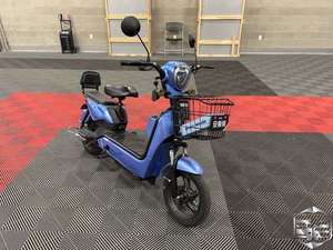 lot 6216 image: IREV - IRANCH - Blue Electric Motorcycle - Unused  Assembly Required 