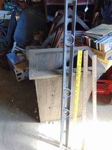 lot 2582 image: 4 Foot Level - Exterior Trash canBag Holder  Vintage Yard Sticks