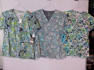lot 67900 image: APPEARS NEW - Peaches, MC2 & Urbane Medical Scrub Tops Bundle - Floral and Butterfly Prints ( Size Small) 3 Pack