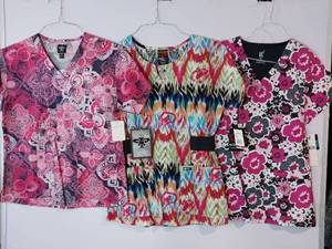 lot 67987 image: APPEARS NEW - Med Couture, MC2 & EckoRed Designer Medical Scrub Top Bundle (Size XS) 3 Pack