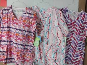 lot 68010 image: APPEARS NEW - BIO & Landau Floral Print Medical Scrub Tops  (Size Medium) Lot of 3