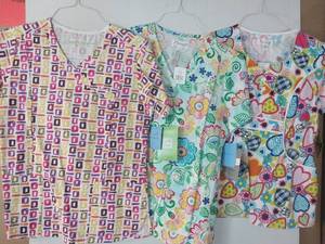 lot 68056 image: APPEARS NEW - Peaches & Bio Brand Medical Scrub Tops (Size Small) Lot of 3
