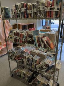 Large Book Lot (Rack not included)  - Retail: $620