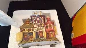 lot 1011 image: Storybook Village The Butcher, Baker and Candlestick Maker