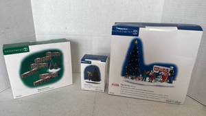 lot 1061 image: Department 56 Snow Village Toys For Tots Collection Set, stone walls and Christmas trimming