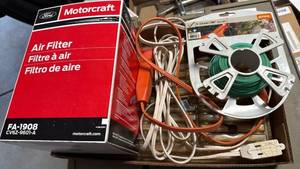 lot 3514 image: Ford Motorcraft air filter, Stihl trimmer line and extension cords