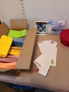 lot 7010 image: Office Supply Bundle - Notepads, Disc Repair Kit & Cleaning Cloth