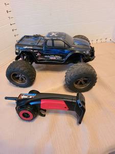 lot 7032 image: XLH RC Monster Truck with Blue Lightning Design with controller