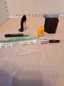 lot 7047 image: Versace, Carolina Herrera, Clinique Happy perfumes, Avon aftershave