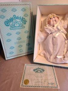 lot 7073 image: Porcelain Cabbage Patch doll, 16in tall, with COA