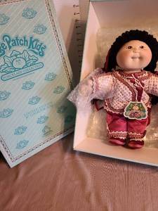 lot 7074 image: Porcelain Cabbage Patch Mai Ling doll, 16in tall