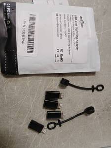 lot 51934 image: USB C to Lightning Adapter - Retail $8