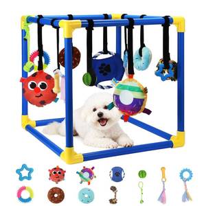 lot 59136 image: Puppy Play Gym with 12 Hanging Toys, Removable Dog Enrichment Playground, Interactive Indoor Training Activity Center for Small Dogs & Puppies, Adjustable PVC Frame, Teething & with Squeaky Toys - Retail $37