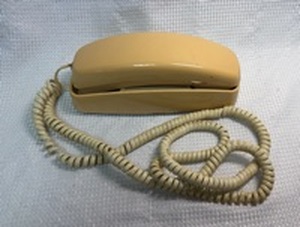 lot 30 image: AT&T Beige Slimline Wall Phone