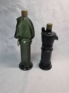 lot 66 image: Avon Pony Post and well spout shaped bottles.  One full.