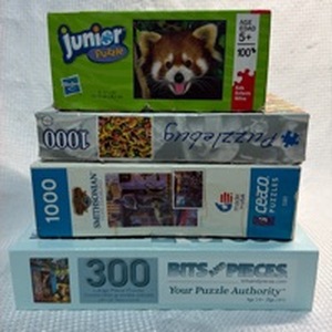 lot 137 image: 4-Pack Puzzle Bundle Collection - Mixed Themes