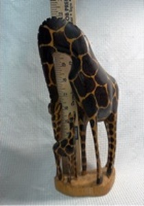 lot 153 image: Hand-Carved Wooden Giraffe Figurine