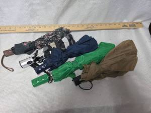 lot 269 image: Compact Folding Umbrellas Collection - Set of 5